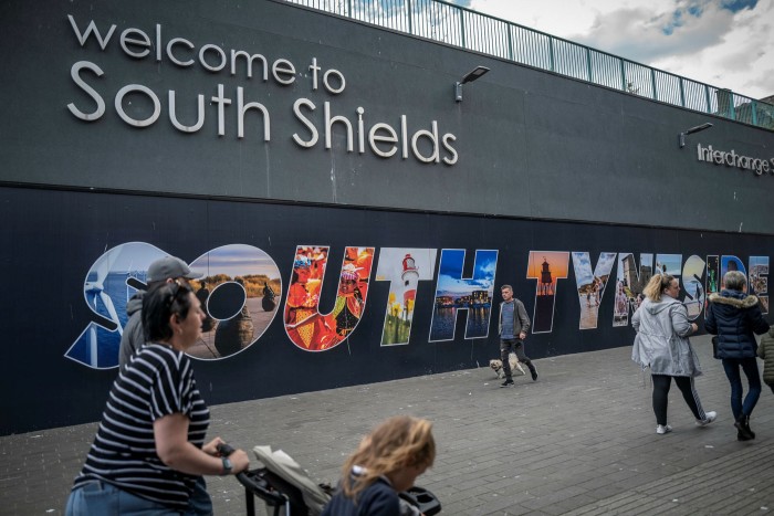 Pedestrians walk up South Shields high street. Dogger Bank, the world’s biggest offshore wind farm, is set to be constructed off the area’s coast and is expected to create more than 1,000 jobs during construction