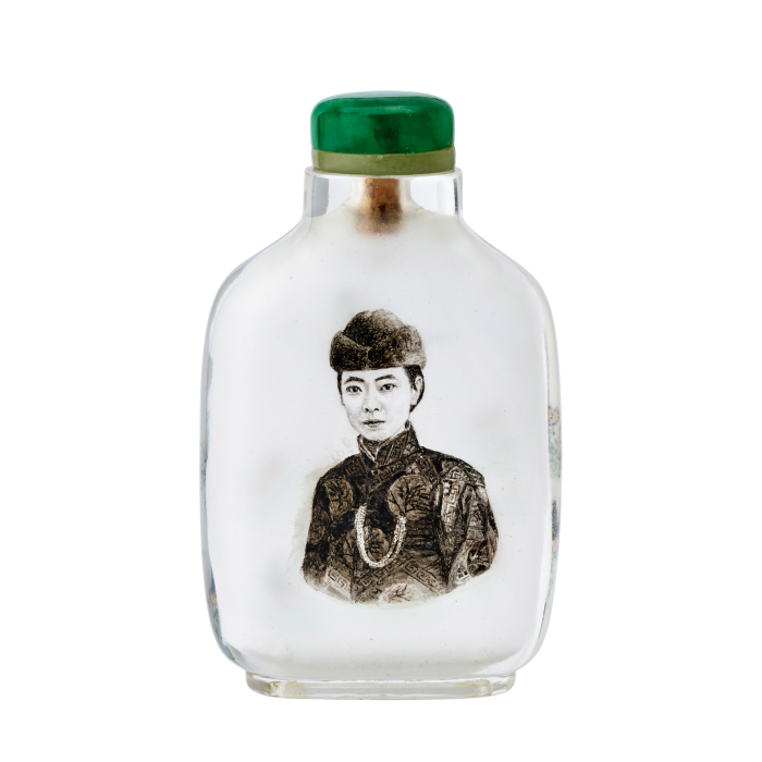 A 1925 glass snuff bottle with an inside-painted portrait sold at Bonhams for $20,312
