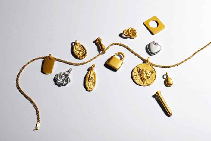 Mene gold and platinum charms, from $225, and gold chain, $1,799