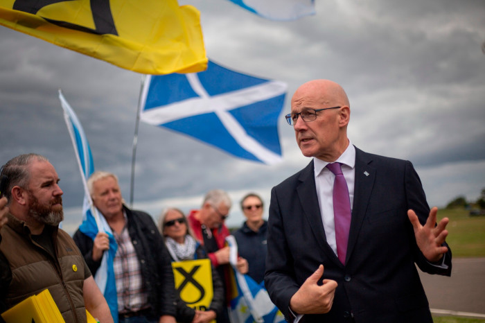John Swinney, first minister of Scotland and leader of the Scottish National party, out canvassing in Nairn, Scotland