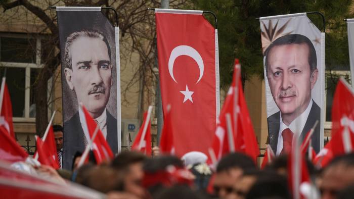 Portraits of Mustafa Kemal Atatürk, founding father of the modern Turkish state, and President Recep Tayyip Erdoğan at a pro-Erdoğan rally in 2017