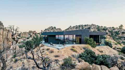 Black Desert House sits on a rocky outcrop near Joshua Tree National Park
