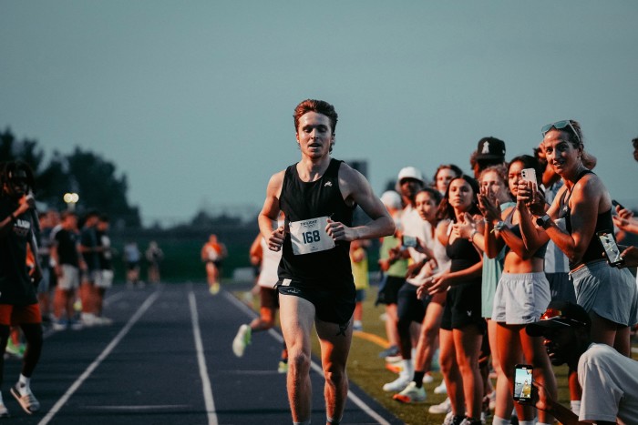 A runner at the Tracksmith Twilight 5,000 race in Detroit