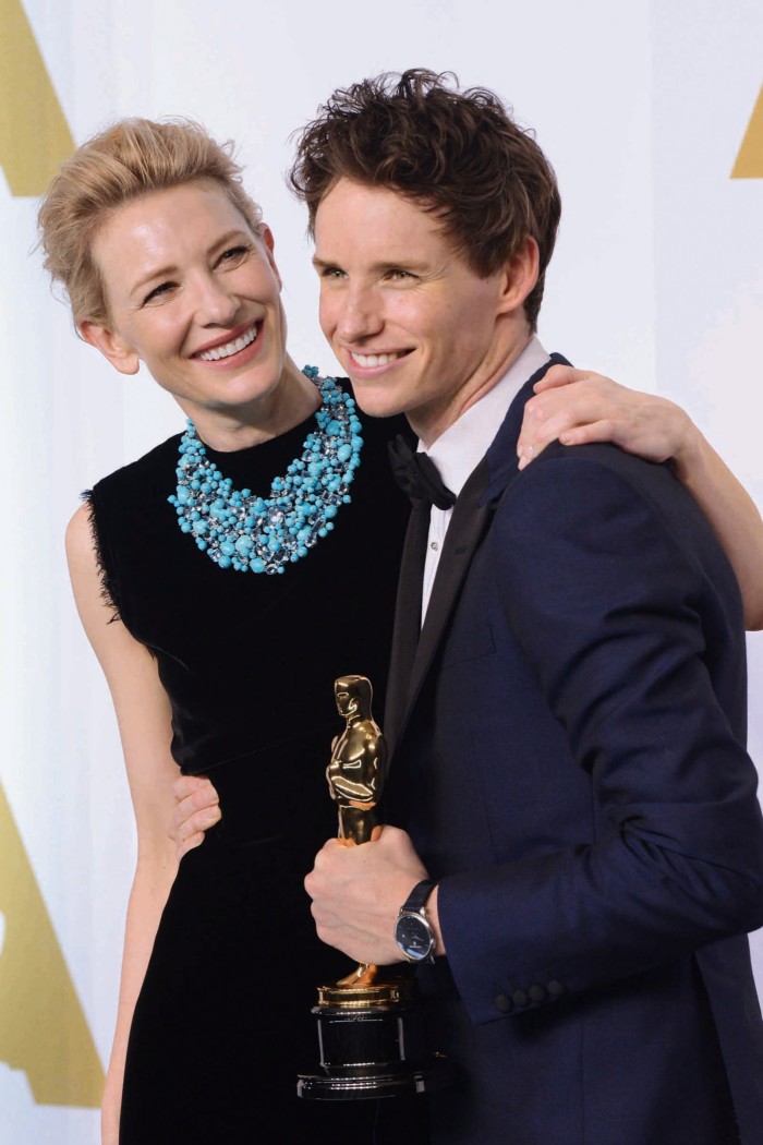 The 2015 Oscars, with Cate Blanchett in a Tiffany & Co turquoise and aqua necklace, and Eddie Redmayne in a Chopard watch