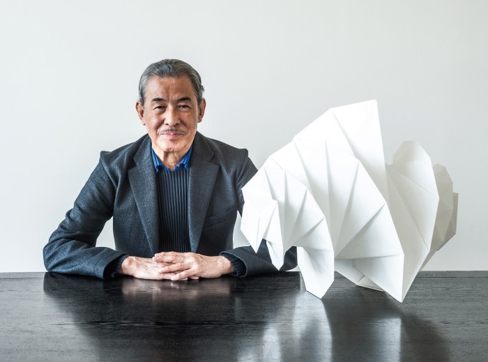 Issey Miyake with his IN-EI Mendori light, £635, at the Issey Miyake Inc headquarters in Tokyo