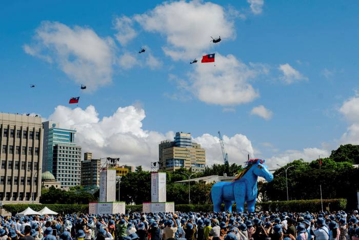Helicopters display the Taiwanese flag during the island’s 2021 National Day celebration