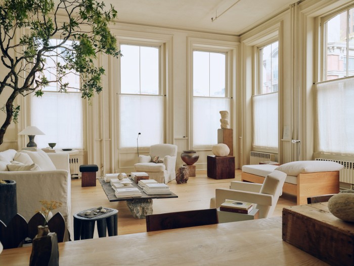 Custom furniture sits alongside objets trouvés in King’s living room