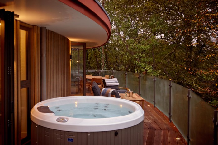 A heated plunge pool on a treehouse terrace