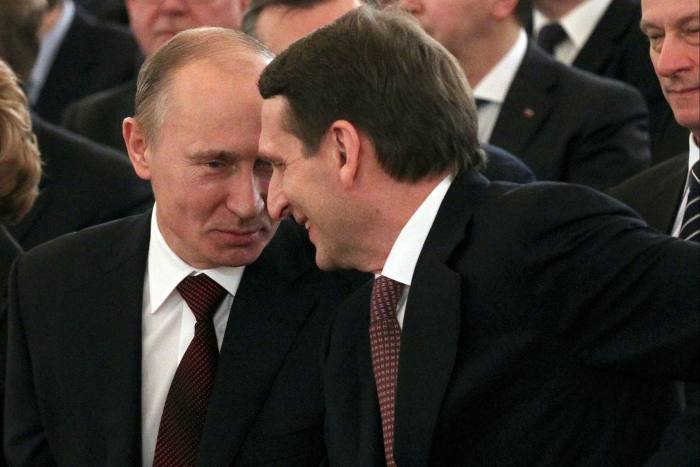 Putin chats and smiles with Sergei Naryshkin (now Russia’s foreign intelligence chief) in 2011 . . .