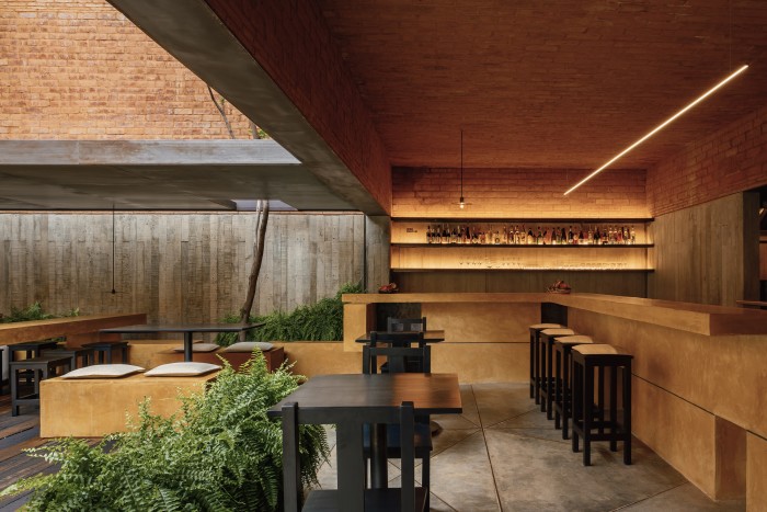 The hotel’s contemporary spaces are punctuated by planted courtyards