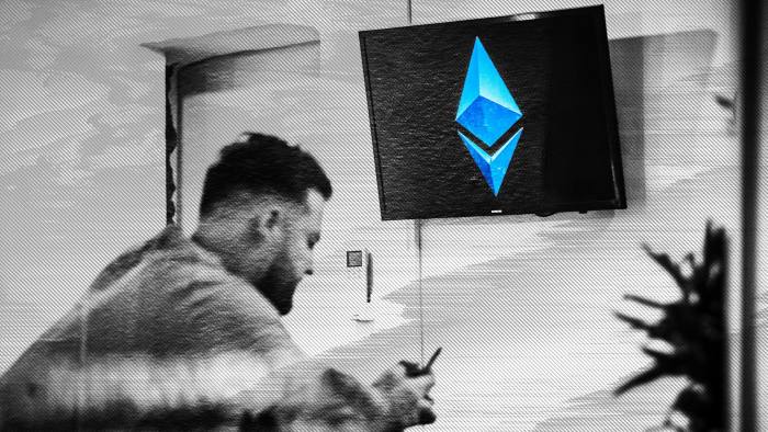 Ethereum logo on an electronic screen inside a cryptocurrency exchange in Barcelona