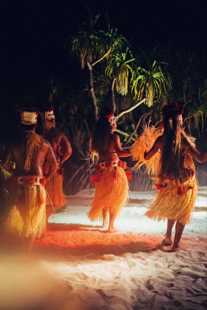 A Polynesian dance ritual on the beach