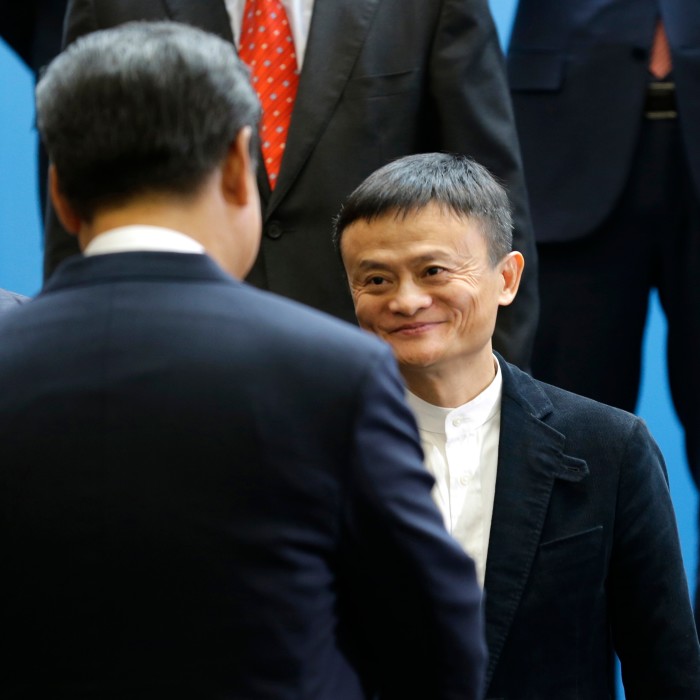 A smiling Jack Ma meeting Xi Jinping during a visit to Microsoft in Washington, in 2015