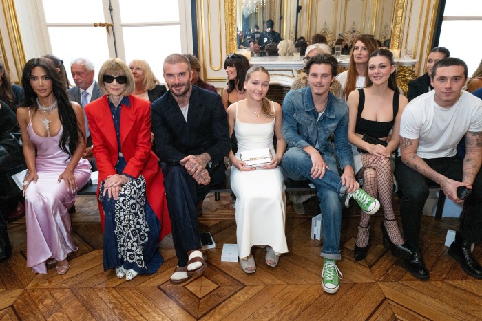 From left: Kim Kardashian, Anna Wintour, David, Harper and Cruz Beckham, Nicola Peltz Beckham and Brooklyn Beckham at the Victoria Beckham SS24 fashion show, September 2023