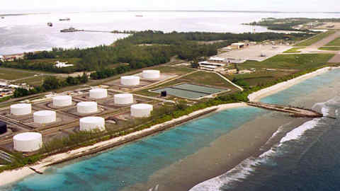 UNDATED FILE PHOTO - File photo of fuel tanks at the edge of a Military airstrip on Diego Garcia, largest island in the Chagos archipelago and site of a major United States military base in the middle of the Indian Ocean leased from Britain in 1966. Exiled inhabitants of Diego Garcia began a challenge July 17 to a British government decision to kick them off the remote island 30 years ago to make way for the U.S. base. [Thousands of islanders from the 65-island Chagos archipelago, many of them born in exile in Mauritius, want Britain to return them to their homeland]