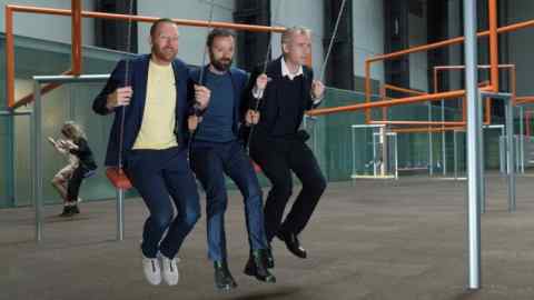 Jakob Fenger, Bjørnstjerne Christiansen and Rasmus Nielsen (left to right) of the Danish collective Superflex at their Turbine Hall commission 'One Two Three Swing!'