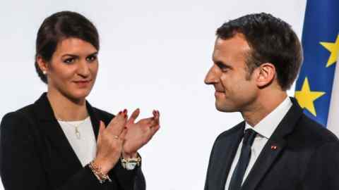 (From L) French humorist and patron of the association &quot;Women Safe&quot; Florence Foresti and French Junior Minister for Gender Equality Marlene Schiappa applaud after French President Emmanuel Macron (R) delivered a speech during the International Day for the Elimination of Violence Against Women, on November 25, 2017 at the Elysee Palace in Paris. / AFP PHOTO / POOL / LUDOVIC MARIN (Photo credit should read LUDOVIC MARIN/AFP/Getty Images)