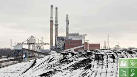 A pile of coal sits outside the NRG Energy Inc. Will County Generating Station, a coal-fired power plant, in Romeoville, Illinois, U.S., on Monday, Jan. 8, 2018. The White House's plan to bail out America's coal country has been shot down -- by the very energy regulators that President Donald Trump appointed last year. Photographer: Daniel Acker/Bloomberg