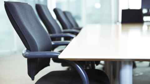 Empty chairs in a business boardroom. Very narrow depth of field shot with Tilt Shift.