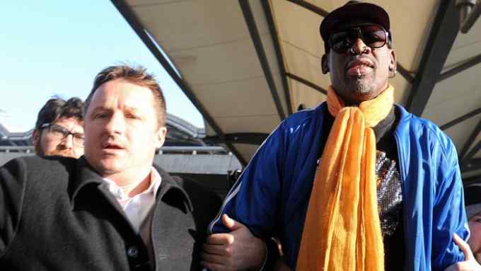 (FILES) In this file photo taken on January 13, 2014 Michael Spavor (L) and former US basketball player Dennis Rodman (R) arrive at Beijing International Airport from North Korea. - Ottawa on December 13, 2018 identified the second Canadian questioned in China as Michael Spavor, and said he has been missing since he last made contact with Canadian officials. (Photo by WANG Zhao / AFP)WANG ZHAO/AFP/Getty Images