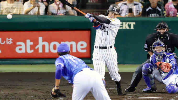 Takashi Toritani of the Hanshin Tigers hits an RBI double in the second inning against the DeNA BayStars at Koshien Stadium in Nishinomiya, Japan, on Sept. 8, 2017, his 2,000th career hit. Toritani became the 50th player in Japanese baseball history to reach the plateau. (Kyodo) ==Kyodo (Photo by Kyodo News via Getty Images)