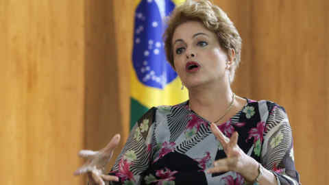 Dilma Rousseff, Brazil's president, speaks during an interview at the Presidential Palace in Brasilia, Brazil, on Tuesday, March, 31, 2015. Rousseff said her government will do whatever it takes to meet its fiscal target this year, hours after surprising analysts with a budget deficit that was twice as wide as forecast. Photographer: Lula Marques/Bloomberg *** Local Caption *** Dilma Rousseff