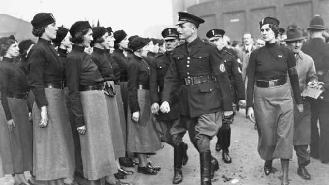 Oswald Mosley, leader of the British Union of Fascists, inspects a parade of women members in 1934