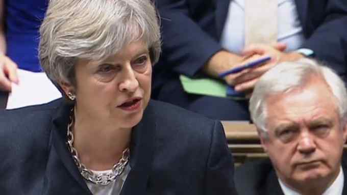 A video grab from footage broadcast by the UK Parliament's Parliamentary Recording Unit (PRU) shows Britain's Secretary of State for Exiting the European Union (Brexit Minister) David Davis (R) listen as Britain's Prime Minister Theresa May as she addresses MPs in the House of Commons in London on October 9, 2017. British Prime Minister Theresa May was set tell the European Union on Monday that &quot;the ball is in their court&quot; as her divided government resumes Brexit negotiations in Brussels. She will use a speech in the House of Commons to urge both sides to show &quot;flexibility&quot; in seeking a deal on Britain's withdrawal from the EU, her Downing Street office said. / AFP PHOTO / PRU AND AFP PHOTO / HO / RESTRICTED TO EDITORIAL USE - MANDATORY CREDIT &quot; AFP PHOTO / PRU &quot; - NO USE FOR ENTERTAINMENT, SATIRICAL, MARKETING OR ADVERTISING CAMPAIGNSHO/AFP/Getty Images