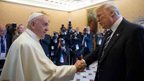 Pope Francis shakes hands with U.S. President Donald Trump during a private audience at the Vatican, May 24, 2017. Osservatore Romano/Handout via REUTERS ATTENTION EDITORS - THIS PICTURE WAS PROVIDED BY A THIRD PARTY. EDITORIAL USE ONLY. NO RESALES. NO ARCHIVE.     TPX IMAGES OF THE DAY