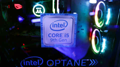 FILE PHOTO: The Intel logo is seen on a computer at the Thailand Game Show 2018 in Bangkok, Thailand, October 26, 2018. REUTERS/Athit Perawongmetha /File Photo GLOBAL BUSINESS WEEK AHEAD