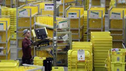 PETERBOROUGH, ENGLAND - NOVEMBER 15: Parcels are processed and prepared for dispatch at Amazon's fulfillment centre on November 15, 2016 in Peterborough, England. In the lead up to Christmas, Amazon is experiencing the busiest time of the year. (Photo by Dan Kitwood/Getty Images)