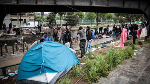 End of the road? A makeshift migrant and refugee camp under a highway near Porte de la Chapelle, Paris