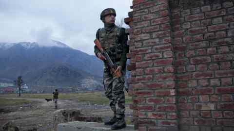 An Indian soldier on duty in Srinagar, Kashmir