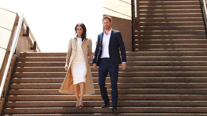 SYDNEY, AUSTRALIA - OCTOBER 16:  Prince Harry, Duke of Sussex (R) and Meghan, Duchess of Sussex (L) arrive at the Sydney Opera House on October 16, 2018 in Sydney, Australia. The Duke and Duchess of Sussex are on their official 16-day Autumn tour visiting cities in Australia, Fiji, Tonga and New Zealand.  (Photo by Mark Metcalfe/Getty Images)