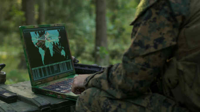 M79F3G Military Operation in Action, Soldiers Using Military Grade Laptop Use Military Industrial Complex Hardware for Accomplishing International Mission.