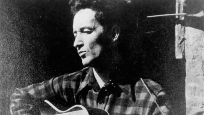 Woody Guthrie performing in the 1940s