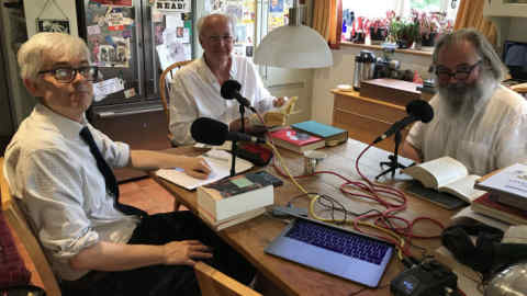 From left, Andy Miller, Philip Pullman and John Mitchinson record an episode of 'Backlisted' in Pullman's kitchen