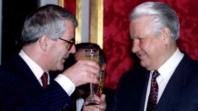 British Prime Minister John Major (L) drinks a toast with Russian President Boris Yeltsin in the Kremlin February 15th. Russia and Britain agreed not to aim their nuclear weapons at each other's territories and to hold joint military exercised