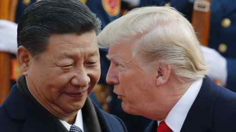 In this Nov. 9, 2017, photo, U.S. President Donald Trump, right, talks to Chinese President Xi Jinping during a welcome ceremony at the Great Hall of the People in Beijing. The brewing China-U.S. trade conflict features two leaders who‚Äôve expressed friendship but are equally determined to pursue their nation's interests and their own political agendas. But while Trump faces continuing churn in his administration and a tough challenge in midterm congressional elections, Xi leads an outwardly stable authoritarian regime. Xi recently succeeded in pushing through a constitutional reform allowing him to rule for as long as he wishes while facing no serious electoral challenge. (AP Photo/Andy Wong)