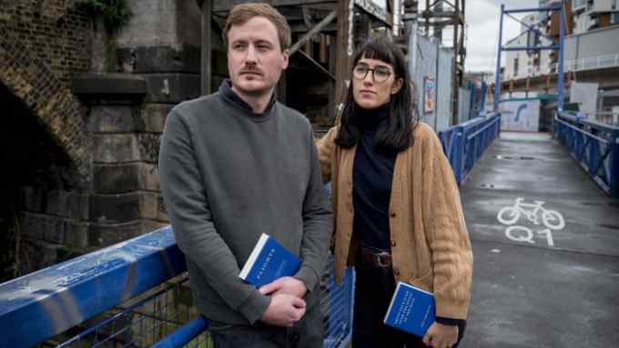 Publisher Jacques Testard and associate publisher Tamara Sampey-Jawad of Fitzcarraldo Editions, the publishing company of Polish writer Olga Tokarczuk, who has been awarded the Nobel Prize for Literature, pose outside their office in Deptford, south London on October 11, 2019.
