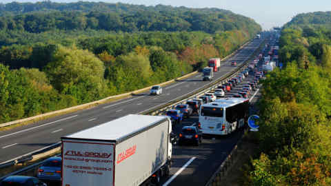 Vehicles stand in a traffic jam near the France-Luxembourg border in Zoufftgen, eastern France on early August 2, 2018, as people are on their way to work. - With a robust economy and a record average annual salary in the OECD, Luxembourg attracts workers. But the expensive real estate prices push nearly one out of two employees to live outside the borders of the Grand Duchy, generating a saturation of transport infrastructure. (Photo by JEAN-CHRISTOPHE VERHAEGEN / AFP) (Photo credit should read JEAN-CHRISTOPHE VERHAEGEN/AFP/Getty Images)