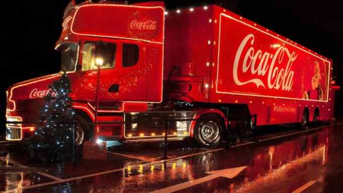 A Coca Cola lorry comes into town to light up the local supermarket car park in December 2012.