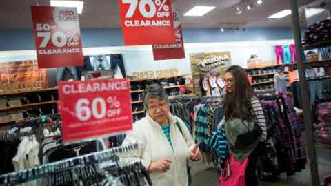 Shoppers browsing at a JC Penney store inside the Queens Center Mall in New York
