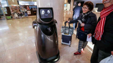 Panasonic's prototype delivery robot, HOSPI, designed to serve bottled beverages and provide bus information, is pictured at a hotel near Narita International Airport in Narita, Japan January 17, 2017. REUTERS/Toru Hanai - RC180BCD1640