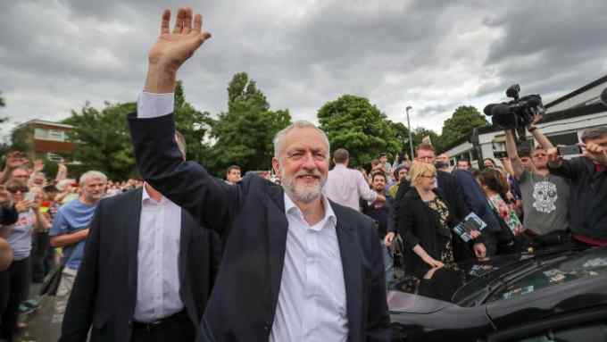 NOTTINGHAM, ENGLAND - JUNE 03: Labour leader Jeremy Corbyn waves to supporters after a rally of supporters at Beeston Youth and Community Centre he visits the East Midlands during the final weekend of the General Election campaign on June 3, 2017 in Nottingham, England. If elected in next week's general election Mr Corbyn is pledging to create a million new jobs and to scrap zero-hours contracts. (Photo by Christopher Furlong/Getty Images) ***BESTPIX***