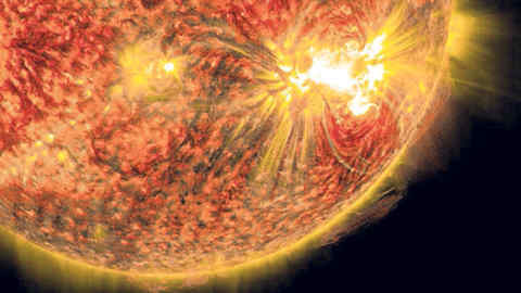 The bright light in the lower right of the sun shows an X-class solar flare on Oct. 26, 2014, as captured by NASA's SDO. This was the third X-class flare in 48 hours, which erupted from the largest active region seen on the sun in 24 years. This flare was classified as an X2.0-class flare and it peaked at 6:56 a.m. EDT.