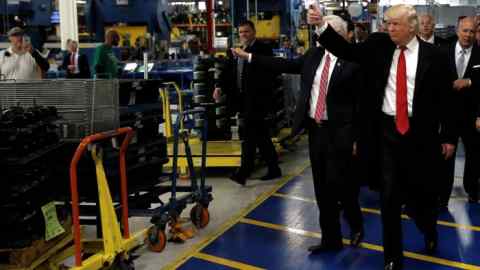 U.S. President-elect Donald Trump and Vice-President Elect Mike Pence tour a Carrier factory in Indianapolis, Indiana, U.S., December 1, 2016. REUTERS/Mike Segar - RC19F904A9D0
