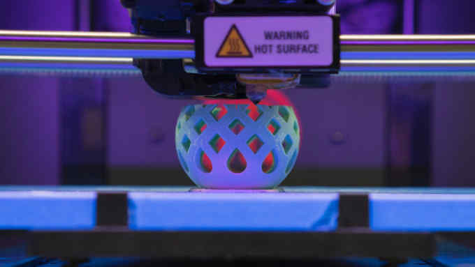 3D Printer making a plastic bowl.
