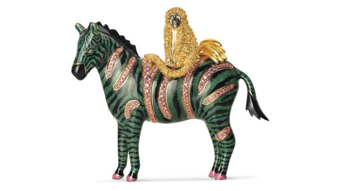 Chaumet’s Trésors d’Afrique ‘Espiègleries’ zebra brooch in white, yellow and pink gold, set with onyx, round pink and yellow sapphires and Grand Feu enamel, £POA, chaumet.com