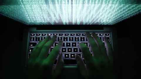 Illustration file picture shows a man typing on a computer keyboard in Warsaw...A man types on a computer keyboard in Warsaw in this February 28, 2013 illustration file picture.  High-level Chinese hackers recently tried to break into a key Canadian computer system, forcing Ottawa to isolate it from the main government network, a senior official said on July 29, 2014. REUTERS/Kacper Pempel/Files (POLAND - Tags: BUSINESS SCIENCE TECHNOLOGY)